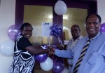 ABG Deputy Speaker, Francesca Semoso(left) and ANG General Manager, Customers & Markets, Dominic Kaumu cutting the ribbon to mark the opening of the new office.